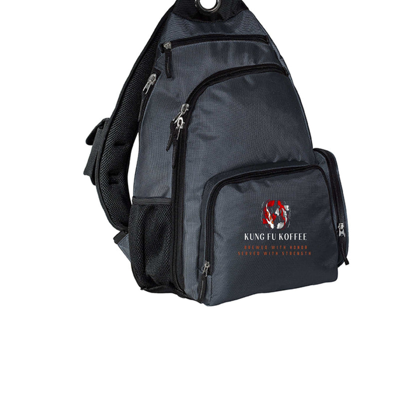 Port Authority BG112 sling backpack in black with multiple zippered compartments and adjustable padded shoulder strap